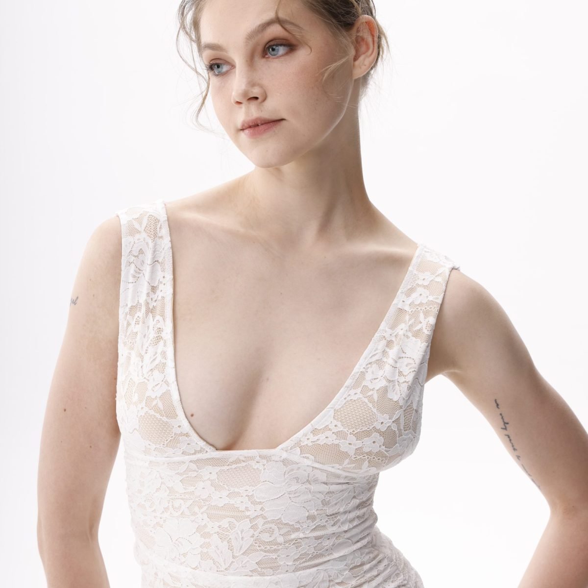 Lenora white lace midi dress, front view of deep scoop neckline