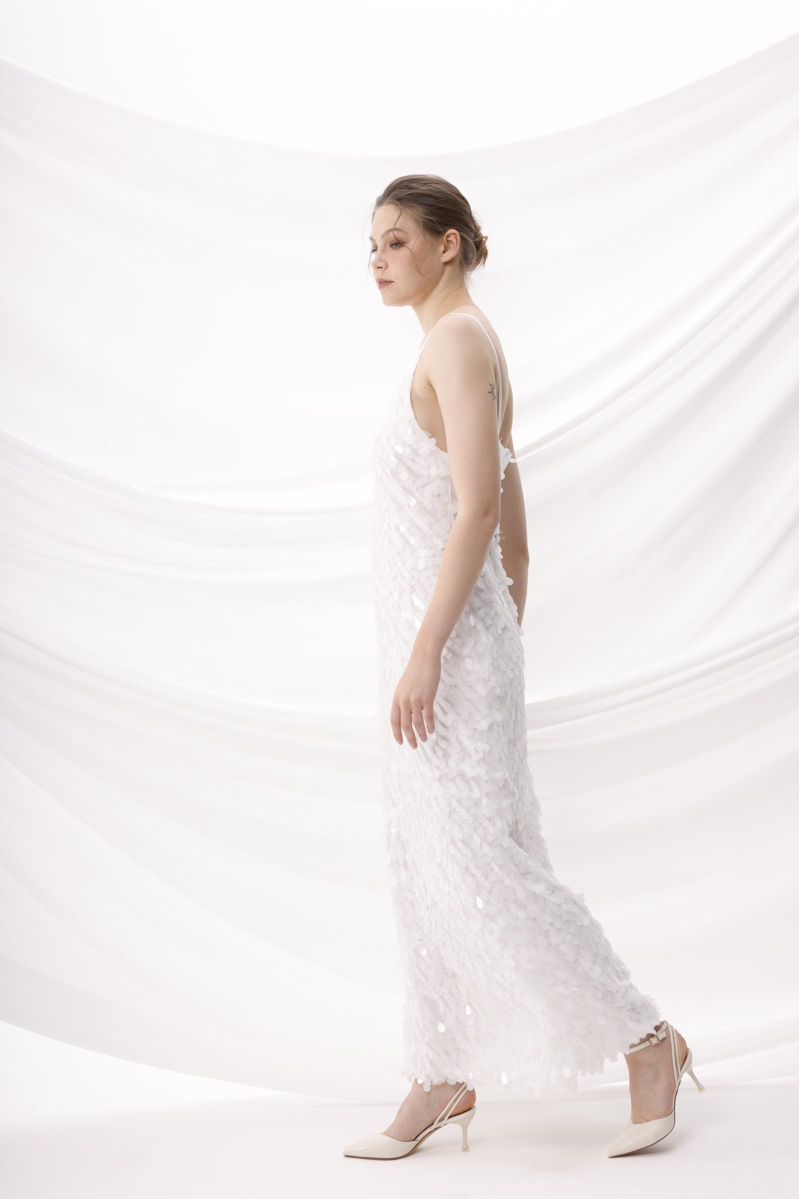 Veda white lace maxi dress, full-length side view in motion